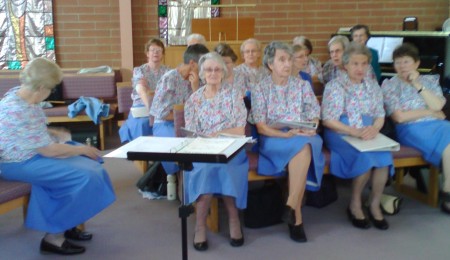 Waverley Singers enjoy a quiet moment before the service